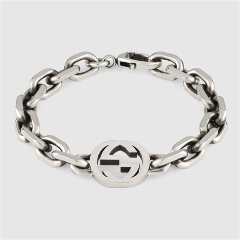 bracciale donna gucci buole gg argento|Bracciale Gucci con ciondolo GG in argento .